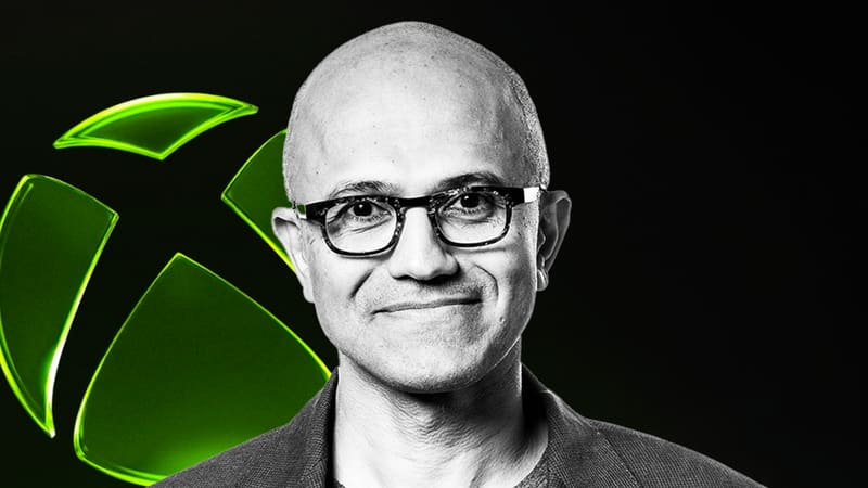 Black-and-white portrait of Satya Nadella in front of the green Xbox logo