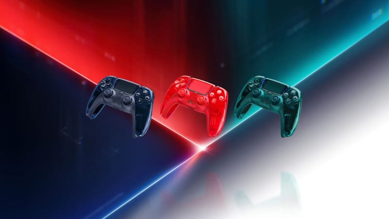 Three transparent PlayStation controllers
